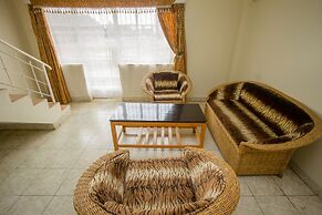 Harlequin Suites Hotel