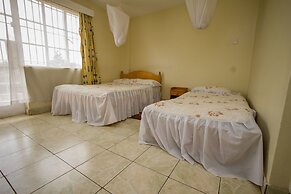 Harlequin Suites Hotel