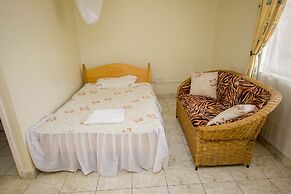 Harlequin Suites Hotel