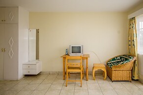 Harlequin Suites Hotel