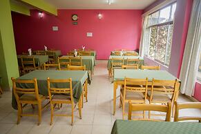 Harlequin Suites Hotel