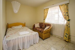 Harlequin Suites Hotel