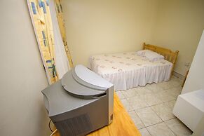 Harlequin Suites Hotel