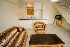 Harlequin Suites Hotel