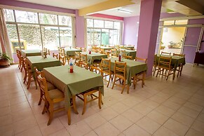 Harlequin Suites Hotel