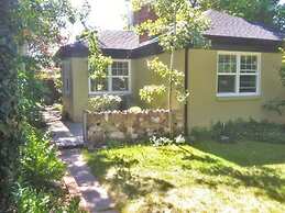 House at the Foot of the Mountains