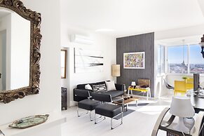 Prime Apartments White and Yellow