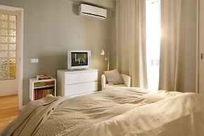 Prime Apartments White and Yellow