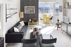 Prime Apartments White and Yellow