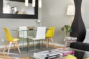 Prime Apartments White and Yellow