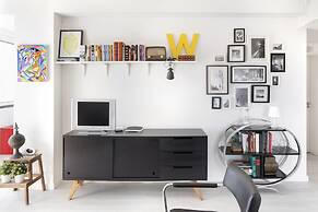 Prime Apartments White and Yellow