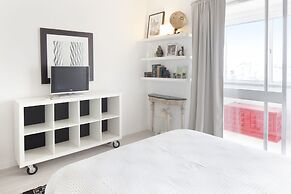 Prime Apartments White and Yellow