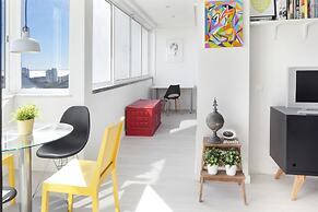 Prime Apartments White and Yellow