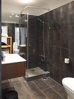 Prime Apartments White and Yellow