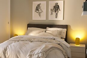 Prime Apartments White and Yellow