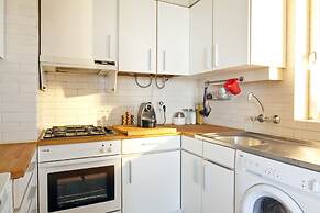 Prime Apartments White and Yellow