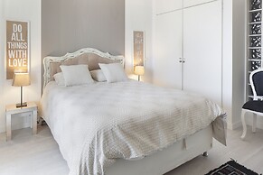 Prime Apartments White and Yellow