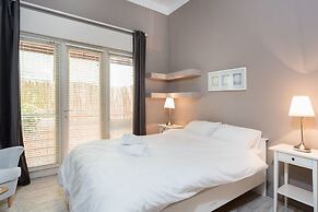 Modern Charm Balcony Retreat by Sea N Rent