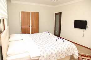 Royal Inn Seza Residence
