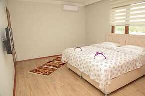 Royal Inn Seza Residence