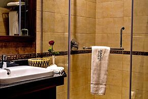 Magna Hotel and Suites