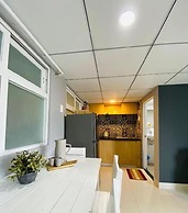 The Homee Cozy Modern Studio Apartment