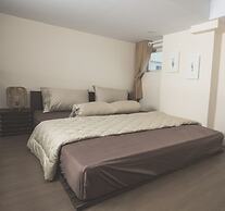 The Homee Cozy Modern Studio Apartment