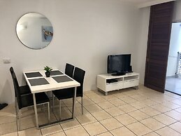 Hibiscus On Palm Cove at Marlin Waters