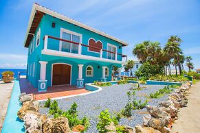 Stunning Coral View Home with Oceanfront Pool by RedAwning