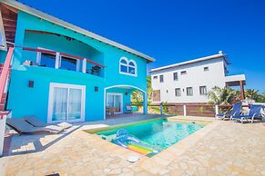 Stunning Coral View Home with Oceanfront Pool by RedAwning