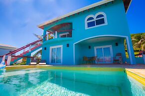 Stunning Coral View Home with Oceanfront Pool by RedAwning