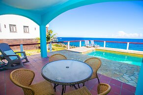 Stunning Coral View Home with Oceanfront Pool by RedAwning