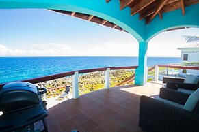 Stunning Coral View Home with Oceanfront Pool by RedAwning
