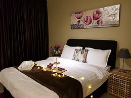 Euzmo Residences at Trefoil