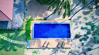 Sanjis The Seaside Cabanas