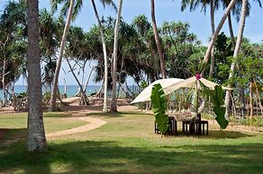 Sanjis The Seaside Cabanas