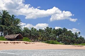 Sanjis The Seaside Cabanas