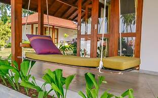 Sanjis The Seaside Cabanas