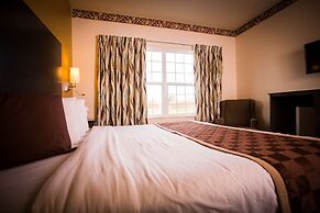 Chisholm Inn & Suites