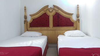 Zuzu's Kitchen & Apartments