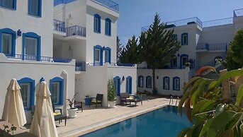 Zuzu's Kitchen & Apartments