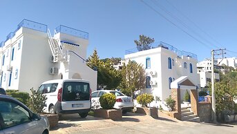 Zuzu's Kitchen & Apartments