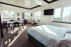 Andromeda Downtown Suites