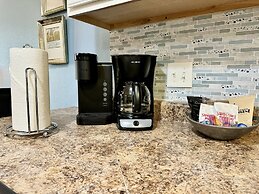 Upper level Condo A-7 with Large Private Balcony by RedAwning