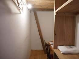 Taketa station hostel cue