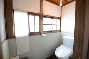 Taketa station hostel cue