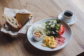 Taketa station hostel cue