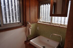 Taketa station hostel cue