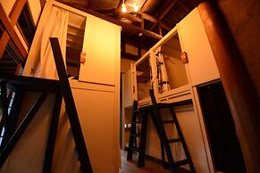 Taketa station hostel cue