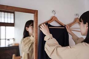 Taketa station hostel cue